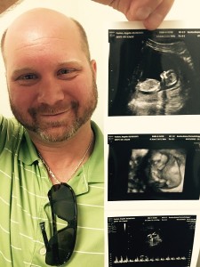 Editor Angie Fenton and her husband Jason Applegate will welcome Baby Applegate in January 2016. (And yes, Jason had just finished shedding a few happy tears when this photo was taken.)