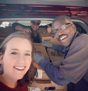 A kind Walmart employee helps load a minivan full of turkeys headed to New Hope Services.