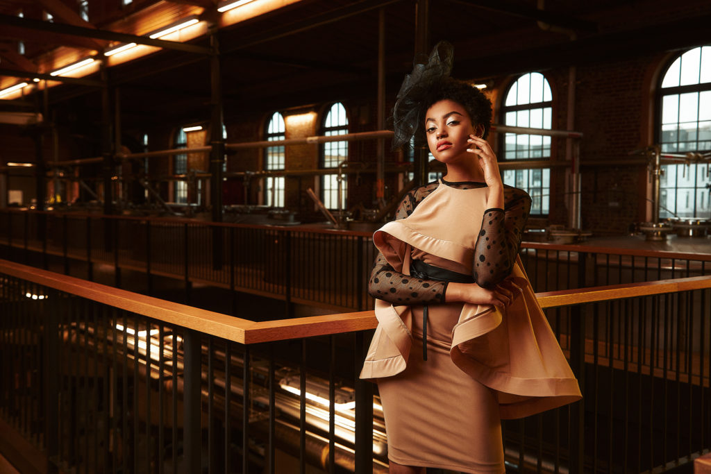 Shantay in CQ by CQ Tan Ruffle Dress from Sapphire on Spring $49 / Black Sheer top from Strandz and Threadz $44.99 / Black Fascinator from Ben Franklin $54.99