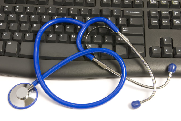 Stethoscope On Computer Keyboard
