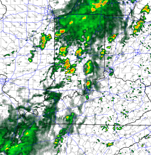 Weather radar map showing scattered rain and storms across the region; green indicates light rain, yellow/orange indicates heavier cells.