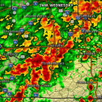 Color radar map showing heavy storms around Louisville and Elizabethtown with red and orange bands spreading toward Bowling Green menacing the area