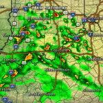 Weather radar map of central Kentucky and southern Indiana at 8 AM Saturday, showing scattered to widespread rain. Green areas indicate light rain, yellow moderate, and red heavy rainfall near Bloomington, Louisville, Evansville, and extending toward Cincinnati/Falmouth area.