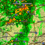Radar map showing widespread rain around Indianapolis and Louisville with heavy yellow and orange patches indicating stronger storms.