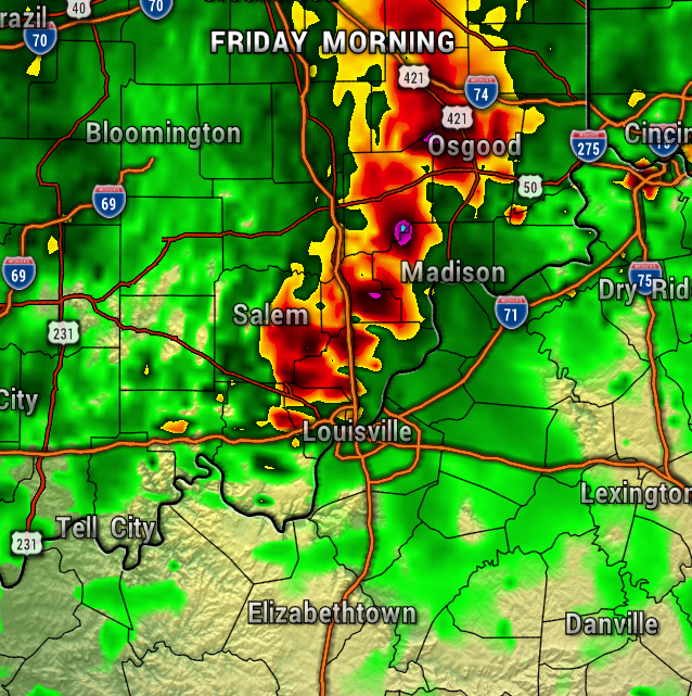 Radar map showing a line of strong thunderstorms around Louisville, with red/purple areas indicating heavy rain and possible hail; green areas are lighter rain.