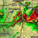 Color radar map at noon Tuesday showing bands of thunderstorms over Kentucky and southern Indiana, including Louisville; red and purple indicate heavy rain and possible hail.