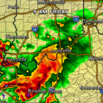 Radar map showing a strong storm system moving east of Louisville, with red/orange bands near Evansville and Bowling Green.