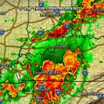 Radar map of heavy storms around Nashville, Bowling Green, Louisville; red/orange indicate intense rain, green lighter rain; time: 5 AM Thursday Morning.